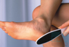 M1117 Pedi-Quick 2-sided foot file in use heel